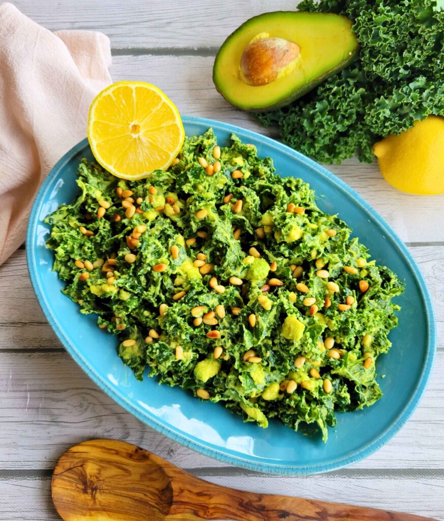 A gut-healthy kale avocado salad with fresh lemon, avocado, and kale.