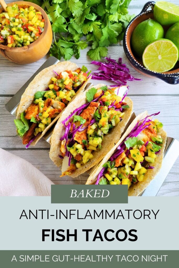 Baked anti-inflammatory fish tacos for a simple gut-healthy taco night. Anti-inflammatory whitefish spice rub, purple cabbage, cilantro, limes, and gut-healing mango salsa. #bakedfishtacos #antiinflammatorymeals #glutenfree #wholefoodsdiet #easyfamilydinner